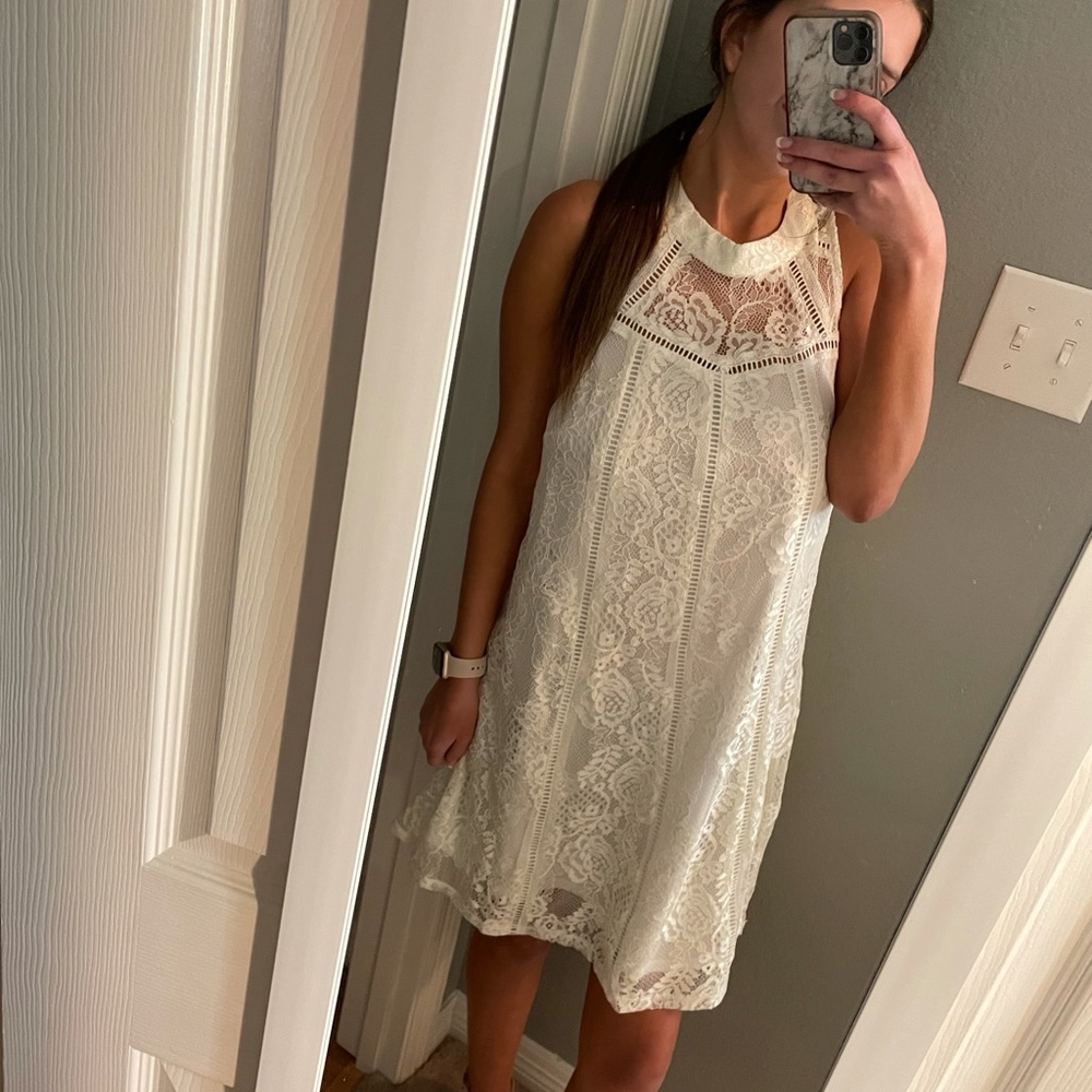 White lace and floral dress. Size: Medium. Brand: Francesca’s
